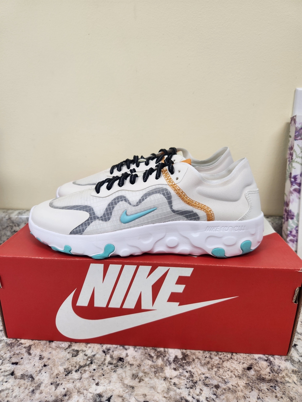LIKE NEW Nike White Athletic Sneakers with Teal, Black & Gold Accents